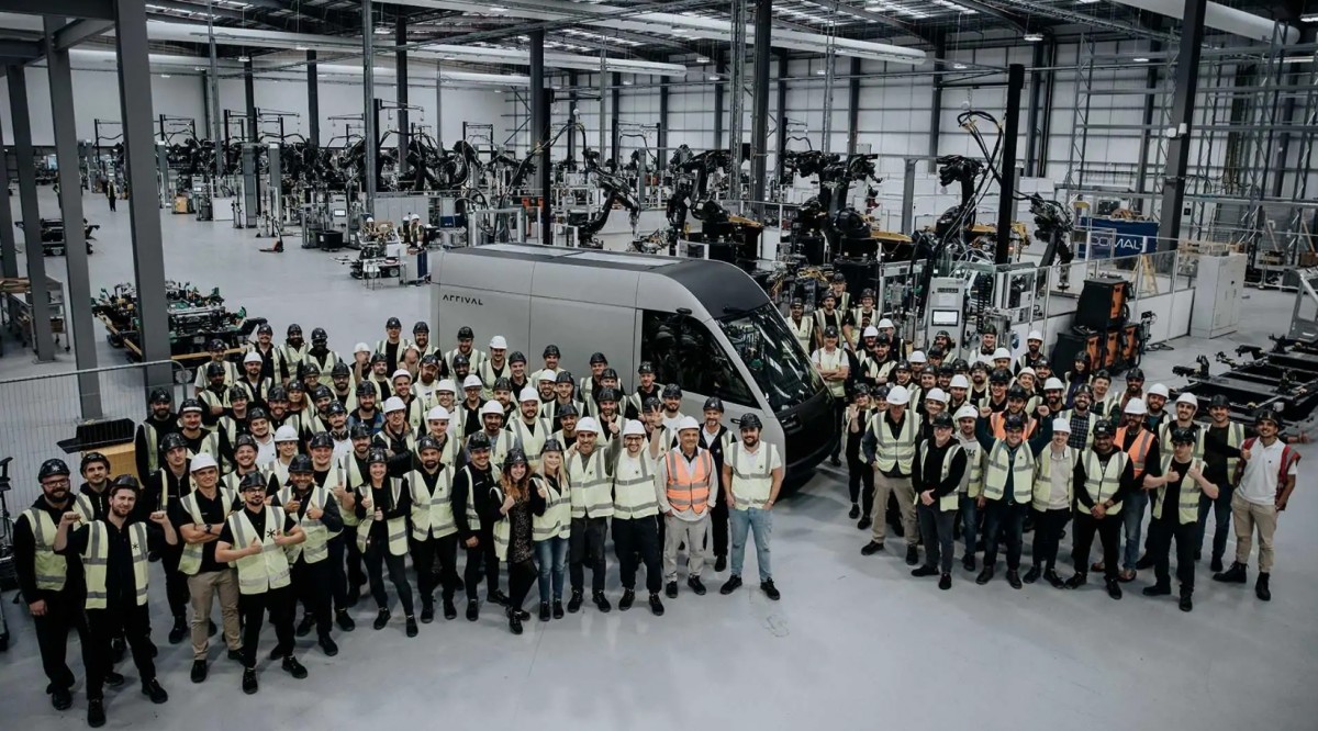 Arrival team celebrating the first production van