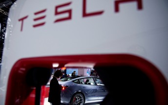 Tesla board agrees to return $735 million in cash and stock