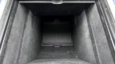 The center storage can be optimized for even more usability with some Tesla dividers.