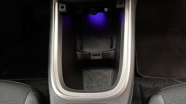 There is a lot of storage room between the front seats, which is very useful for small items.