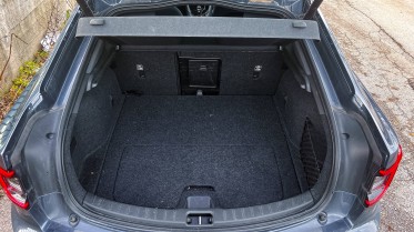 Regular trunk capacity isn't impressive, but with the seats down and the wide hatch opening you can carry very bulky items.