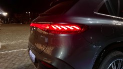 The rear of the EQS SUV looks cool at night with its signature lighting.