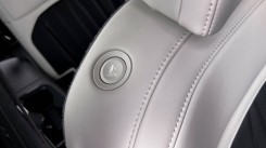 With the push of two buttons the whole seat unhinges as it is and moves forward for easy access.