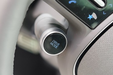 The steering wheel offers multiple functionalities.