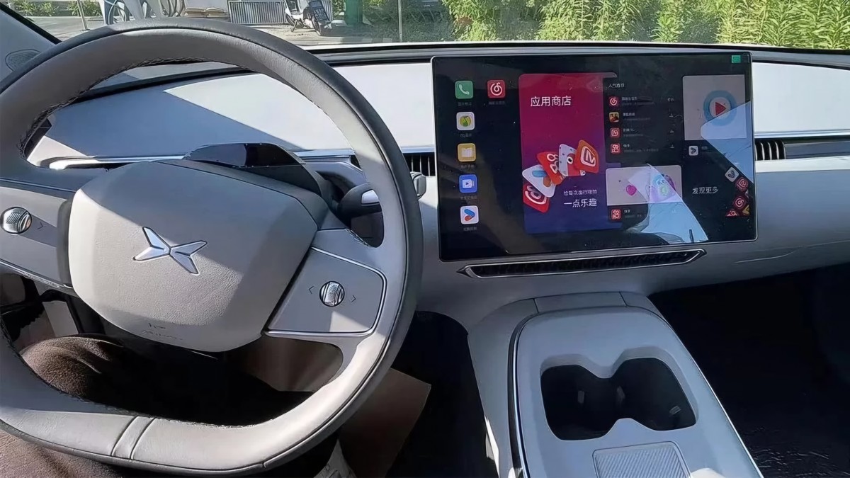 XPeng Mona M03 spy shots reveal Tesla Model 3-inspired interior