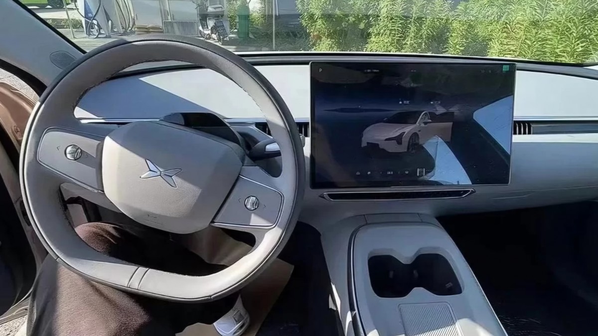 XPeng Mona M03 spy shots reveal Tesla Model 3-inspired interior