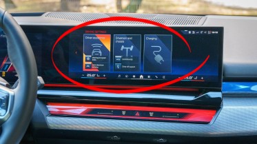 First you press a button on the center console, then the center screen controls.