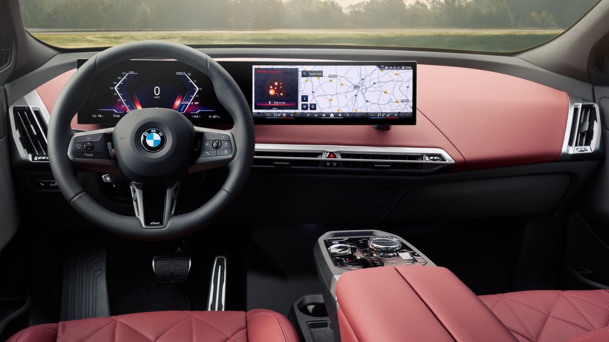 BMW iX gets a price cut, more range, and a fresh face for 2026