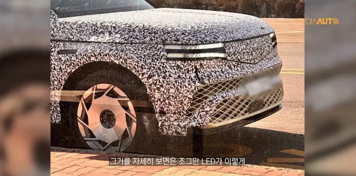 Here's the upcoming Genesis GV90 wearing less camo