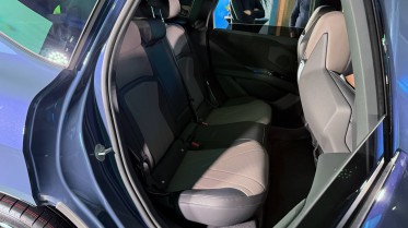 You can easily fit tall adults in the second row.
