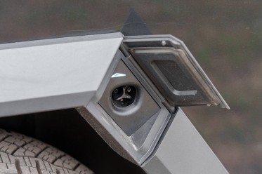 The charge port is small and integrated into the wheel arch.