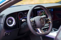 The steering wheel and driver's screen.