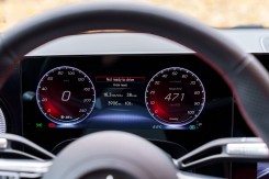 The steering wheel and driver's screen.
