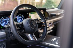 The driver sits comfortably inside.