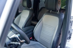 The driver sits comfortably inside.