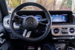 The driver sits comfortably inside.