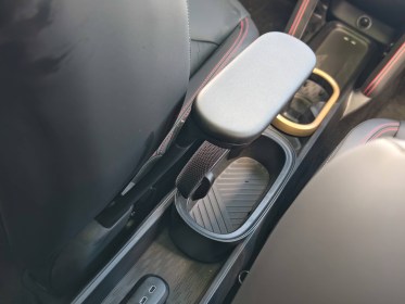Laughably bad integrations for the armrest and sun visor mirror.